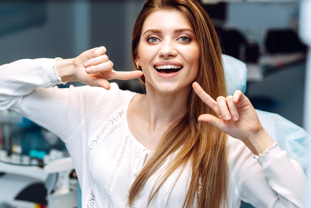 Happy Couple Smiling Outdoors After Dental Care Experience – Dentist San Diego