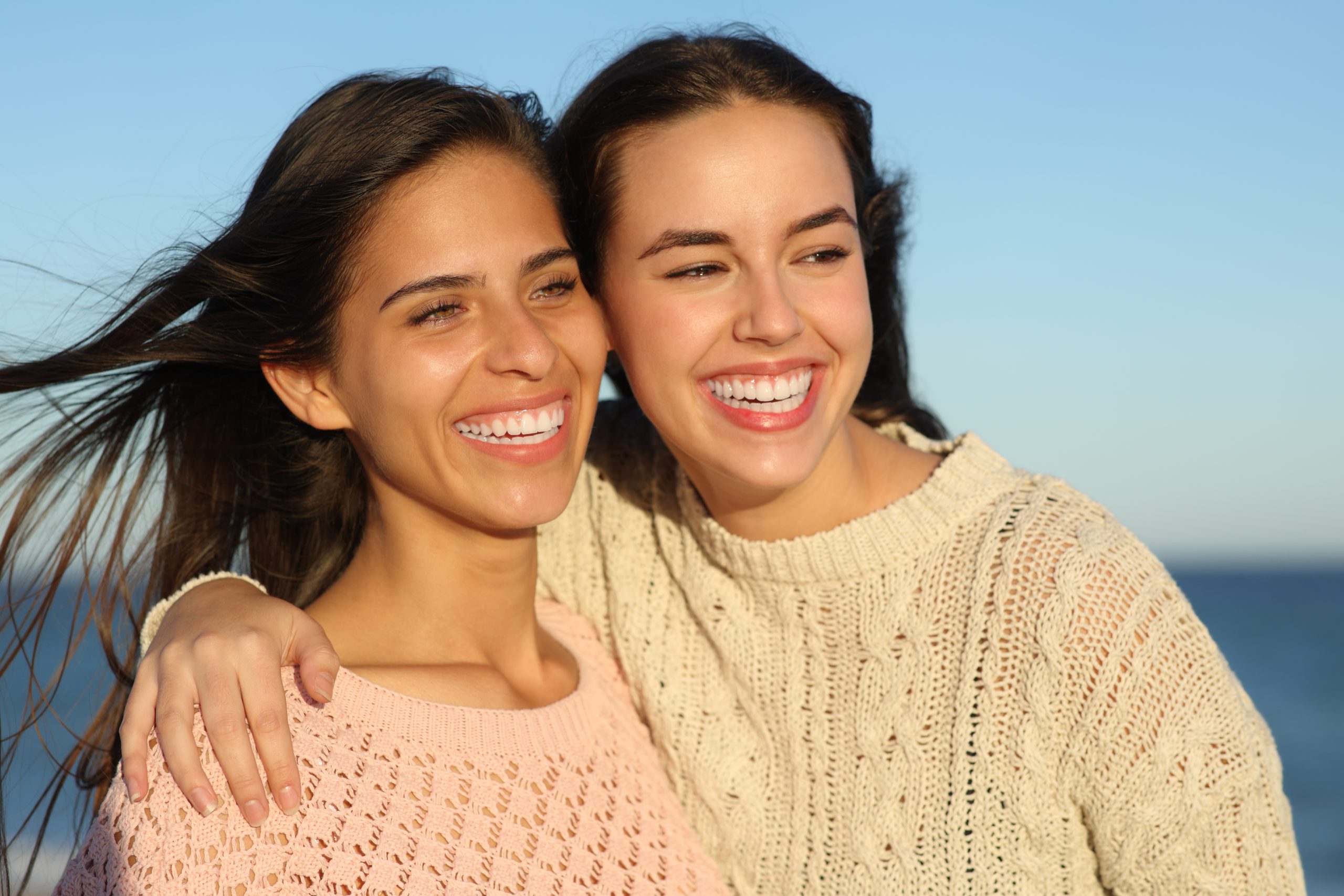 Happy Couple Smiling Outdoors After Dental Care Experience – Dentist San Diego