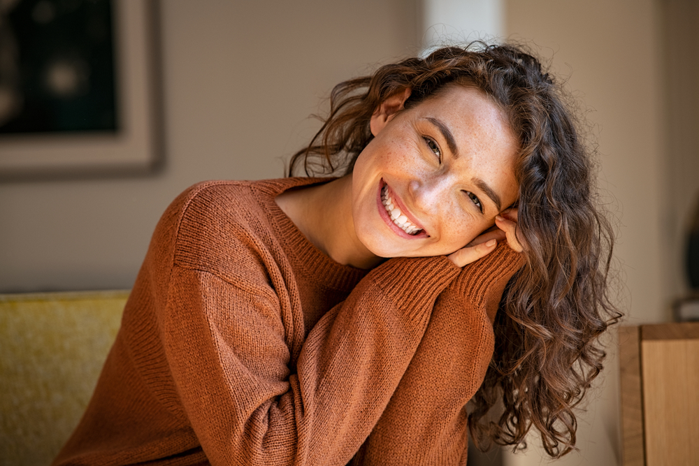 Happy Couple Smiling Outdoors After Dental Care Experience – Dentist San Diego